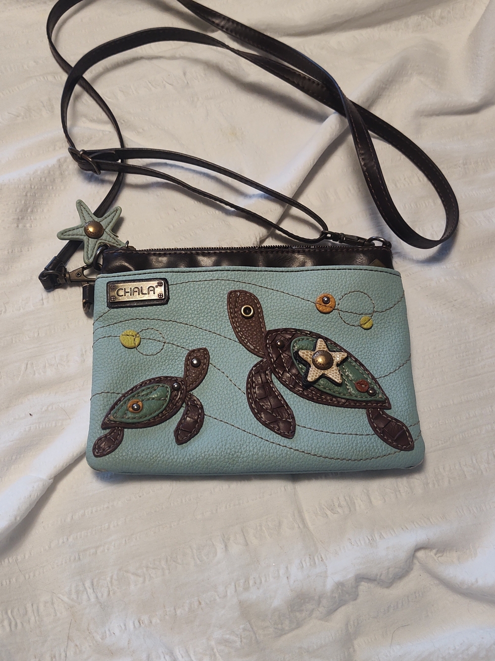 Chala Light Blue Leather Crossbody Bag with Brass Logo
